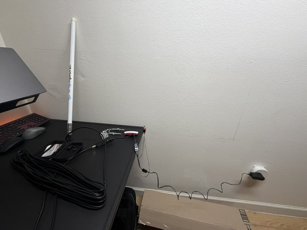 The antenna standing next to a desk during the first indoor test